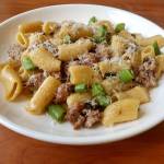 The rigatoni, another handmade pasta, is made with fennel sausage, English peas and a Parmesan brodo. (Sara Bruestle / The Herald)