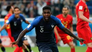 Samuel Umtiti of France celebrates after scoring the games only goal in a 1-0 win over Belgium in the semifinals of the World Cup at the St. Petersburg Stadium in, St. Petersburg, Russia. (AP Photo/Natacha Pisarenko)