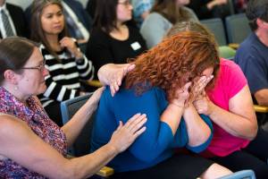 Melissa McCawley is comforted by relatives after hearing that Todd Eugene Brown, 52, is found not guilty at the Snohomish County Courthouse on Thursday in Everett in the deaths of her daughter, Amiyah Johnson, 12, and her niece, Yesterday Wallace, 2. A judge found Brown not guilty of being impaired by methamphetamine when a crash killed the two cousins on I-5 near Lynnwood, even though his blood tested positive for drugs. (Andy Bronson / The Herald)