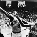 The Supersonics Lonnie Shelton (8) reaches for a rebound along with teammate John Johnson (27) as the Bucks Marques Johnson (8) looks on during a playoff game on April 20, 1980, Seattle. (AP Photo/Grant M. Haller)