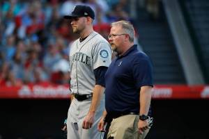 Paxton leaves with injury, Angels pound Mariners 11-2