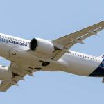 An Airbus A220 lands at Toulouse-Blagnac airport in southwestern France on Tuesday. The aircraft was formerly dubbed the Bombardier C Series. (AP Photo/Frederic Scheiber)