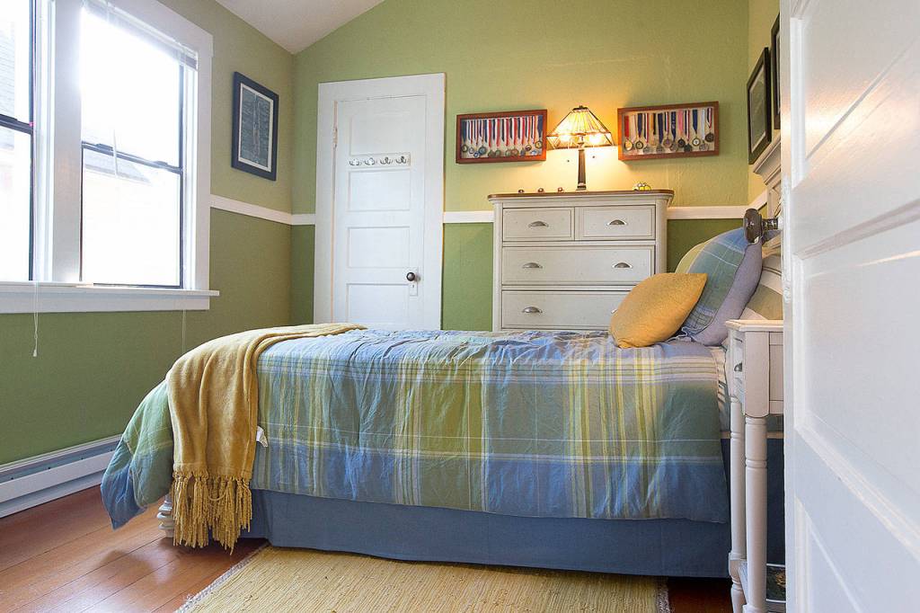 A guest bedroom is shown on one side of Alyssa and Clinton Seals home in Everett. (Ian Terry / The Herald)