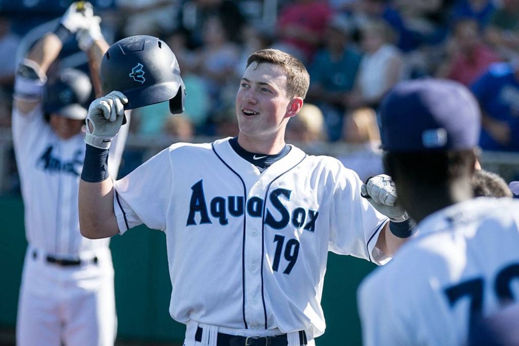 Aquasoxs Charlie McConnell celebrates his home run in the third inning against the Volcanos Sunday afternoon at Everett Memorial Stadium on July 15, 2018. (Kevin Clark / The Herald)