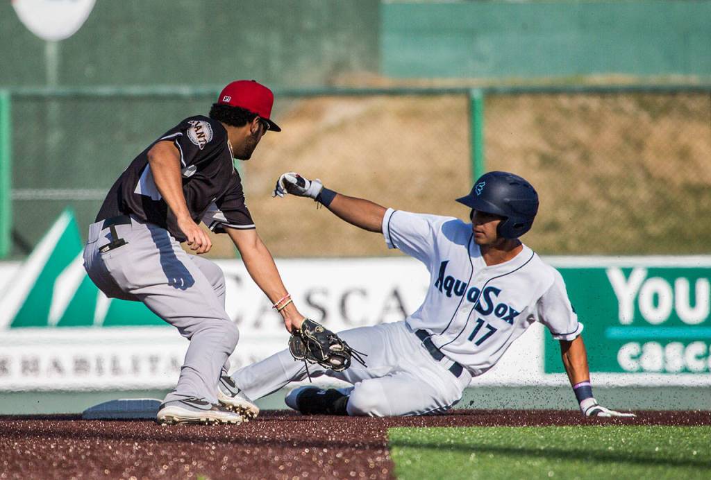 Aquasoxs Nick Rodriguez slides into second base during the game at Everett Memorial Stadium on Sunday, July 15, 2018 in Everett, Wa. (Olivia Vanni / The Herald)
