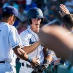 Aquasoxs Connor Kopach highfives his teammates after scoring during the game at Everett Memorial Stadium on Sunday, July 15, 2018 in Everett, Wa. (Olivia Vanni / The Herald)