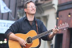 He sings about ignorance, war and greed — and it’s OK to laugh