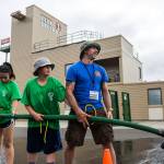 South County firefighter Phil Pons looks up after his team loses at a firehouse game during Kids Fire Camp at South County Fire Administrative Headquarters on Wednesday in Everett. (Olivia Vanni / The Herald)