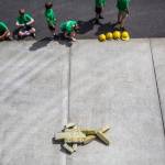 A fire hose dummy lies on the ground during Kids Fire Camp at South County Fire Administrative Headquarters on Wednesday in Everett. (Olivia Vanni / The Herald)