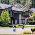 High-end homes dot the cul-de-sac along with more new construction at Quinns Crossing, the scene of an arson 10 years ago. (Kevin Clark / The Herald)