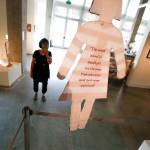 At the Schack Art Center, <a href="https://www.heraldnet.com/life/crying-visitors-reflect-on-americans-interned-exhibit/" target="_blank">co-Artist of the Year Jan Hopkins</a> looks over her displays on July 9. (Dan Bates / The Herald)