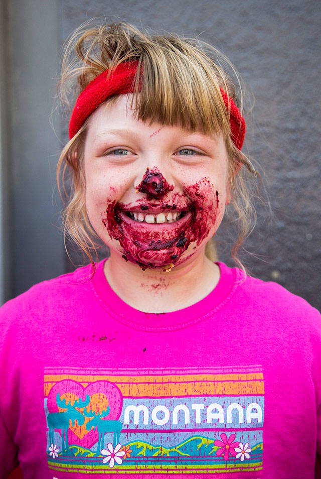 Samantha Redman, 9, one of the Snohomish Pie Company pie eating contest winners during Kla Ha Ya Days on Saturday, July 21, 2018 in Snohomish, Wa. (Olivia Vanni / The Herald)