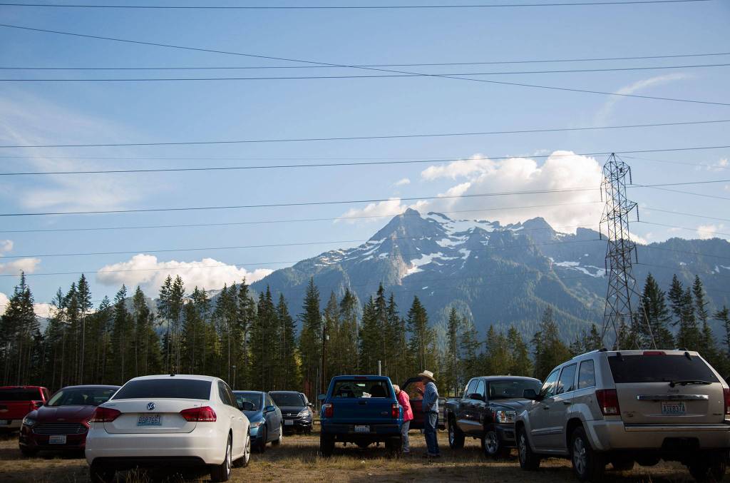 A couple gets out of their car to head into the music venue during the Darrington Bluegrass Festival on Saturday, July 21, 2018 in Darrington, Wa. (Olivia Vanni / The Herald)                                A couple gets out of their car to head into the music venue during the Darrington Bluegrass Festival on Saturday, July 21, 2018 in Darrington, Wa. (Olivia Vanni / The Herald)
