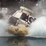 In this 2016 photo, a mockup of Boeings CST-100 Starliner spacecraft, in development in partnership with NASAs Commercial Crew Program, splashes into a 20-foot-deep basin at NASAs Langley Research Center in Hampton, Virginia, during testing of the spacecrafts landing systems design. (David C. Bowman/NASA via AP)
