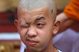 Thai soccer boys’ heads shaved for Buddhist ordination