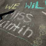 The Marquart and McGowan kids left a message for Quintin Hall on the driveway. (Dan Bates / The Herald)