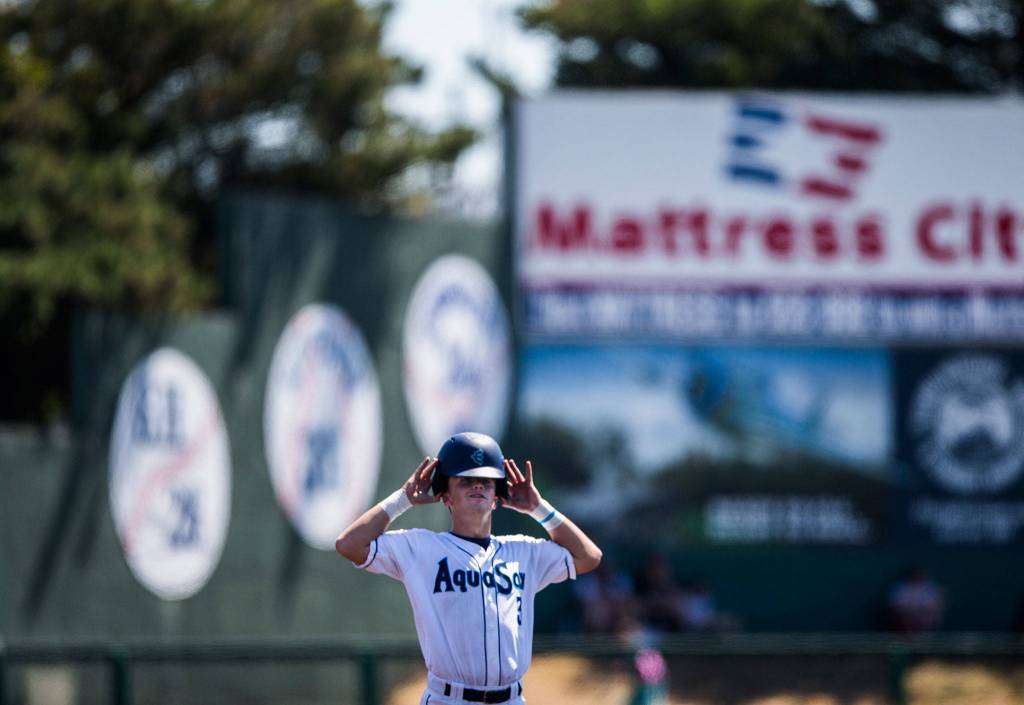 Aquasoxs Bobby Honeyman adjusts his helmet during the game against Vancouver at Everett Memorial Stadium on Thursday, July 26, 2018 in Everett, Wa. (Olivia Vanni / The Herald)