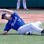 Everetts Cody Culp comes off the pitchers mound to make a sliding catch on a pop fly during the Merchants July 28 game against the Seattle Cheney Studs at Everett Memorial Stadium. (Kevin Clark / The Herald)