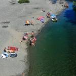 Beginning early last week, people could be seen up and down and in the Pilchuck River at Dubuque Road, just off Machias Road, and just about anywhere else access to the cool waters could be found. (Dan Bates / The Herald)