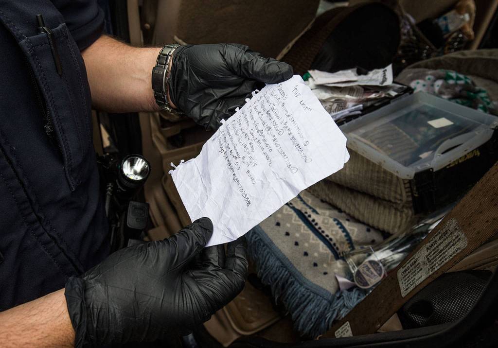 A rip sheet  showing the names of stores, barcode numbers, prices and UPC codes  was found during a search of a vehicle used by shoplifting suspects Thursday, June 14, 2018, in Monroe. Shoplifters find discarded receipts, then make rip sheets to help them organize their thefts. (Andy Bronson / The Herald)