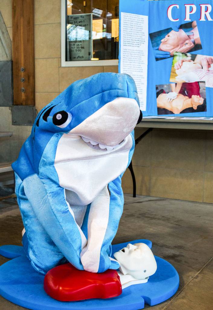 Clark the Shark demonstrates the proper hand placement for CPR. (Submitted photo)