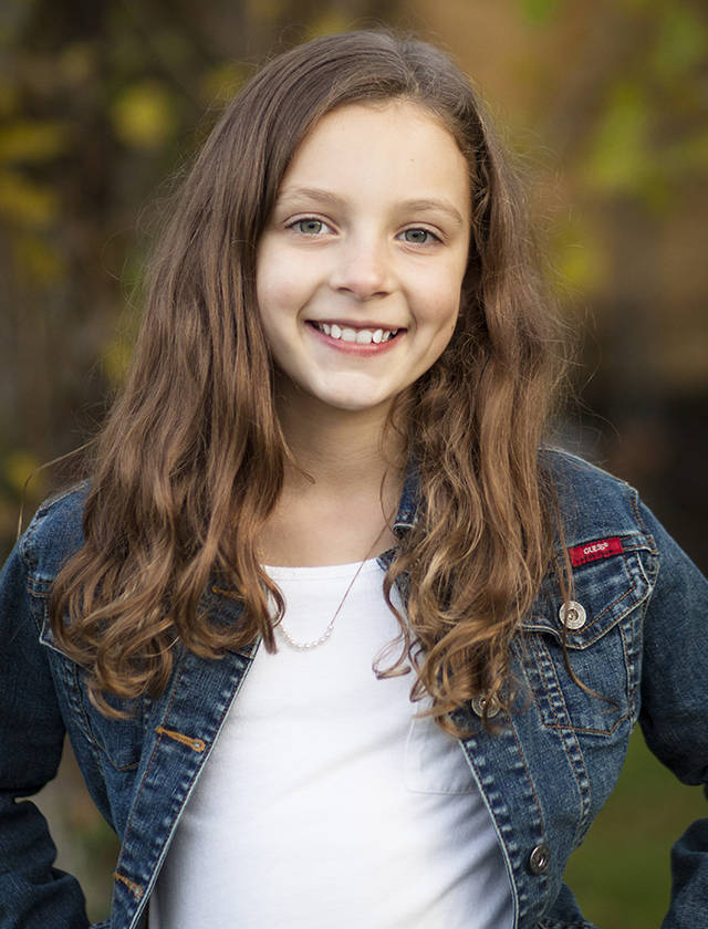 Sarah Harrington is seen here at age 9, when she wrote the winning bio of Clark the Shark for the Lynnwood Recreation Center. (Submitted photo)