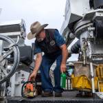 Darrell Gunnells works on packing his utility truck at the Snohomish County Public Utility Districts Operations Center on Thursday in Everett. A fleet of Snohomish County PUD workers was preparing to travel to the Redding, California, area to assist in relief efforts amid the wildfires. (Olivia Vanni / The Herald)