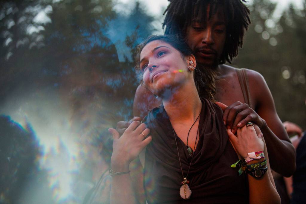 A couple dances during Trevor Halls performance at the Summer Meltdown on Saturday, Aug. 4, 2018 in Darrington. (Olivia Vanni / The Herald)