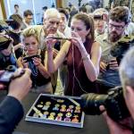 A dog tag and medals belonging to Army Master Sgt. Charles Hobert McDaniel Sr. are displayed Wednesday in Arlington, Virginia. (Bonnie Jo Mount/Washington Post)