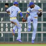 Seattles Dee Gordon (9) and Guillermo Heredia celebrate after the Mariners beat Houston 5-2 on Friday in Houston. (AP Photo/David J. Phillip)