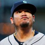 Seattle Mariners starting pitcher Felix Hernandez reacts after allowing a bunt single to Carlos Tocci of the Texas Rangers during the third inning of a game on Aug. 7 in Arlington, Texas. The Rangers won 11-4. (AP Photo/Brandon Wade)