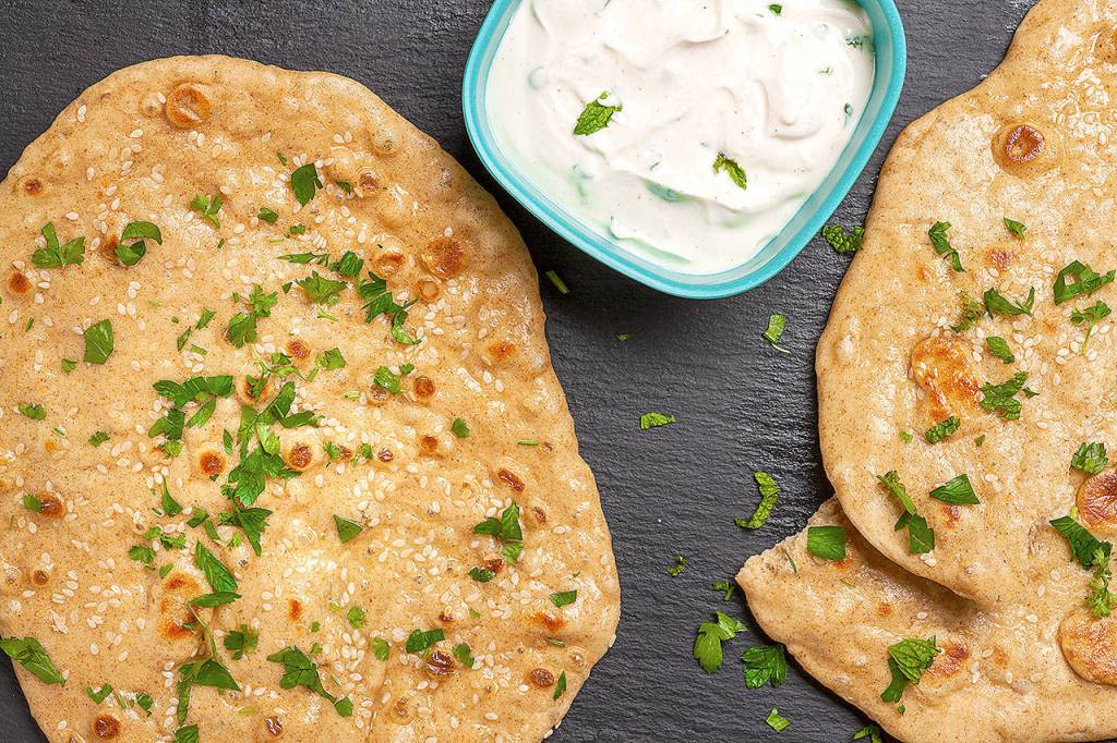 The Indian flatbread known as naan is typically one that can be made fairly quickly, but this one takes only 30 minutes. (Photo by Goran Kosanovic for The Washington Post)