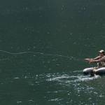 Anna Oenbring of Granite Falls casts a fly into the clear waters of Slide Lake. (Mike Benbow photo)