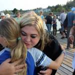 Michelle Seidelman, with Sea Shepherd in Portland, makes the round of hugs that ended the somber event. She travels to the Bring Tokitae Home gathering every year. (Patricia Guthrie/Whidbey News-Times)