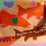 A banner at the Orca Networks Bring Tokitae Home event on Aug. 8 was painted by the Lummi Nation in honor of the orcas captured in Penn Cove in the 1960s and 70s. Tokitae/Lolita, an entertainer at the Miami Seaquarium, is the last surviving killer whale captured from her pod. (Patricia Guthrie/Whidbey News-Times)