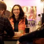 Danielle Lothrop talks with customers at Toggles Bootleshop in Everett last November. She is organizing the first-ever Everett Beer Week, scheduled for Sept. 7-15. (Kevin Clark / Herald file)