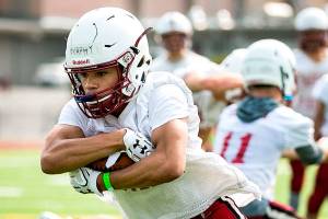 A look at the Cascade football team and its 3-headed monster