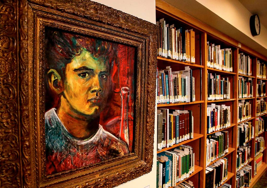 Along with hosting a public event to seal the citys <a href="https://www.heraldnet.com/news/2068-time-capsule-will-show-what-everett-was-thinking-in-18/" target="_blank">125th anniversary time capsule</a>, the Everett Public Library now has a 1961 self-portrait of David Dilgard on display in its Northwest Room. The highly respected historian, who died in May, worked here from 1977 to 2017. (Dan Bates / The Herald)