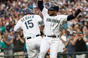 M’s beat Dodgers 5-4 on walk-off balk in extras