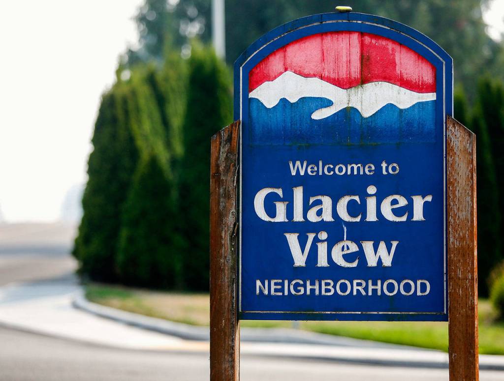 A sign calls attention to the designated neighborhood as drivers approach southward on Colby Ave. at 45th St. SE. (Dan Bates / The Herald)