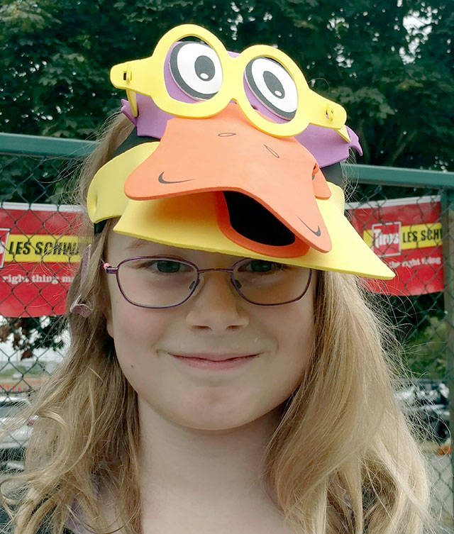 Esme Wright, champion in the first round of Great American Duck Races on Thursday at the Evergreen State Fair.