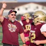 Lakewood defensive coordinator Mitch Robbins calls out to the team evening during practice on Aug. 23, 2018, at Lakewood High School in Arlington. (Kevin Clark / The Herald)