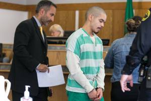 Kevin Clark / The Herald                                Anthony Hernandez-Cano leaves court after pleading guilty to two counts of aggravated murder Monday afternoon at the Snohomish County Courthouse in Everett.