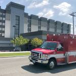 An Everett Fire Department medic unit responds to an explosion at the Delta by Marriott hotel at 2105 Pine St. on Monday. (Andy Bronson / The Herald)