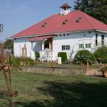 The Old Silvana School is for sale, with two acres and multiple outbuildings and lawn sculptures. (Kevin Clark / The Herald)