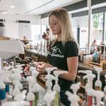 Katie Anderson prepares a coffee order Friday morning at Moes Espresso in downtown Arlington on August 24, 2018. (Kevin Clark / The Herald)