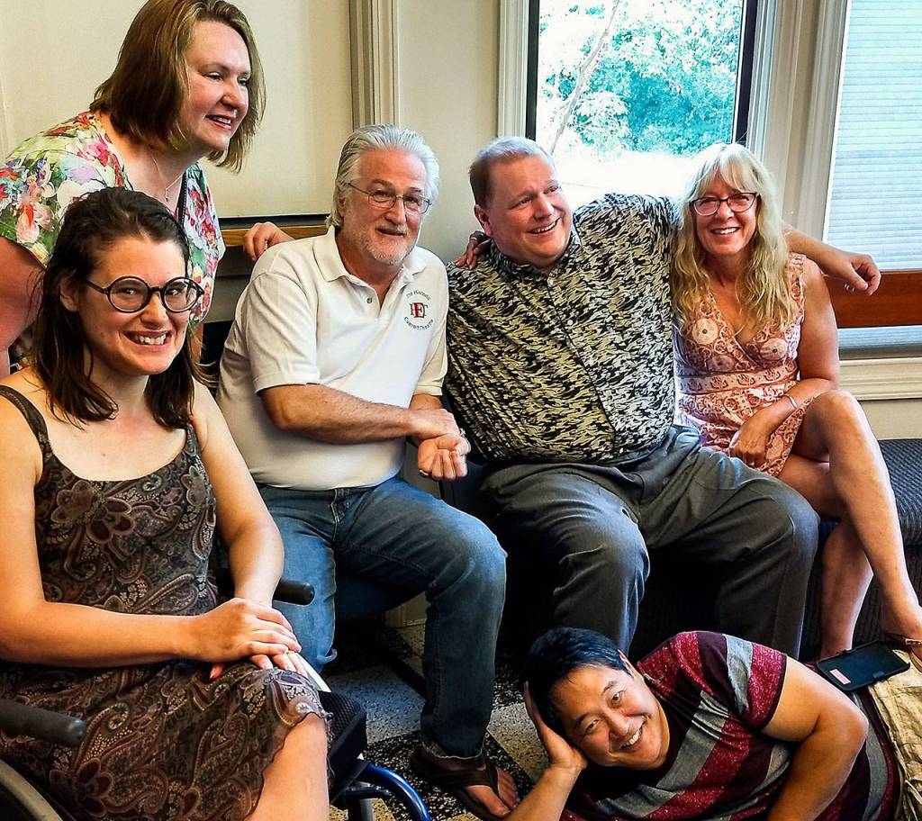 Actor Justin Tinsley (second from right) at an event in his honor with the Edmonds Driftwood Players community in July. Pictured are (from left) Carolyn Agee, Yvonne Velez, Curt Shriner, Tinsley and Laura Shriner, and in front, Randy Yamanaka. The Shriners are part owners and managers of the Everett Historic Theatre, which also honored Tinsley recently. (Courtesy of Randy Yamanaka)