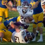 Lake Stevens Jackson Grafe (21) powers into the end zone for a touchdown as the Vikings took a 21-0 lead in the first half against Ferndale on Friday in Ferndale. (Andy Bronson / The Herald)