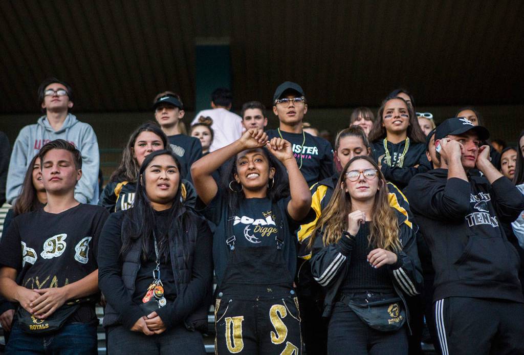 Lynnwood fans watch as their team throws an interception during Fridays game against Nathan Hale on Aug. 31, 2018 in Edmonds, Wa. (Olivia Vanni / The Herald)