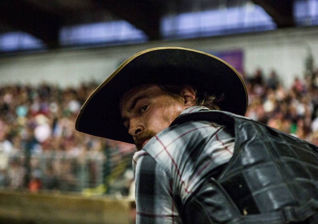 Wyatt Grant concentrates as he gets ready to ride during the Pro-West Rodeo at the Evergreen State Fair on Sept. 1, 2018 in Monroe, Wa. (Olivia Vanni / The Herald)